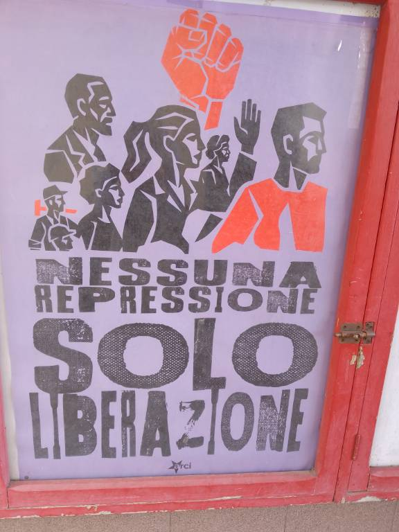 Poster on a wall in Fiesole reading &ldquo;Nessuna repressione, solo liberazione&rdquo;